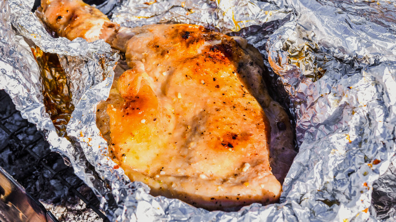 Chicken with aluminum foil