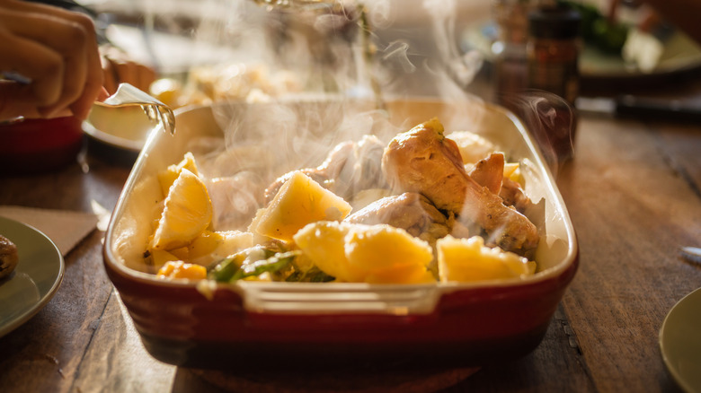 Chicken and potatoes steaming