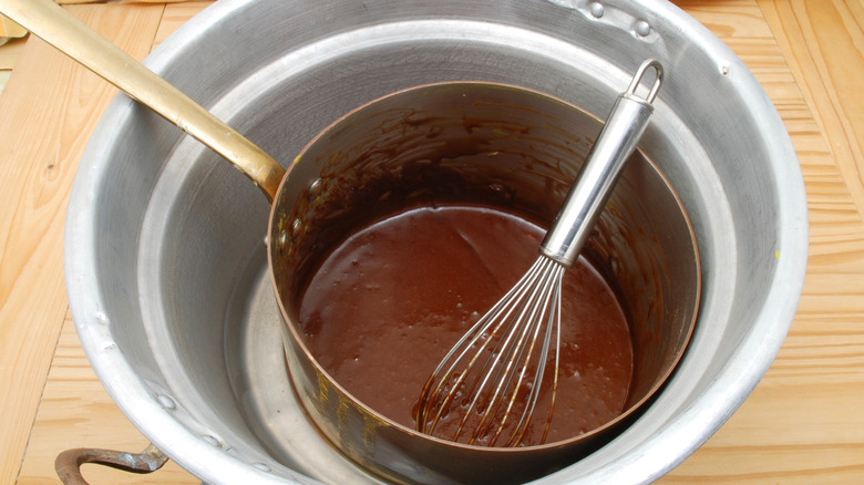 Melting chocolate in tempering system