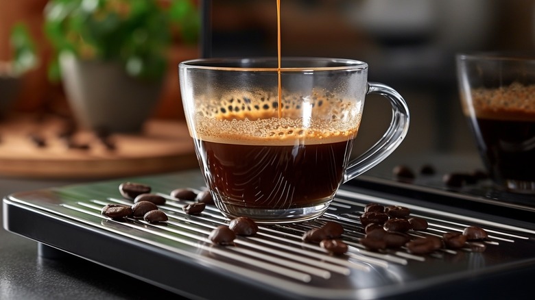 Freshly poured espresso in glass