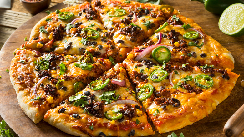 Mexican pizza on cutting board