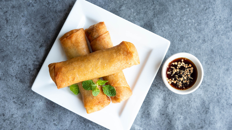 egg rolls on a white plate