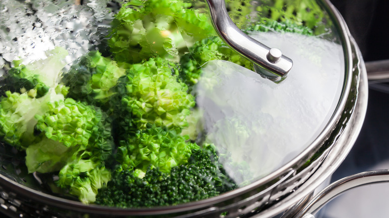 Steaming broccoli in a pot