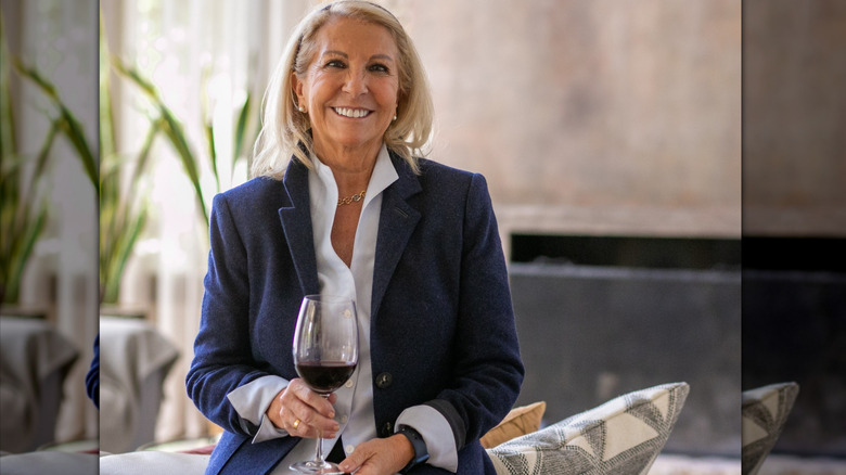 Susana Balbo Argentinian wine producer holding wine glass