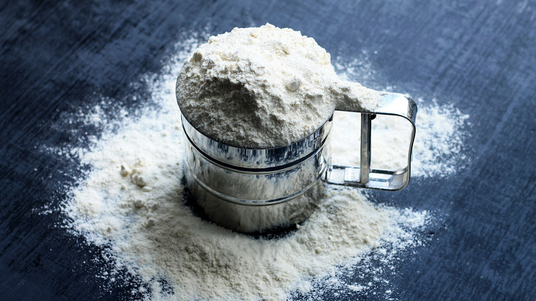 overflowing flour sifter