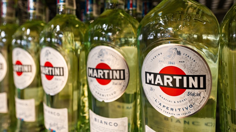 Row of Martini white vermouth bottles