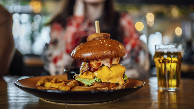 gourmet burger beer at restaurant