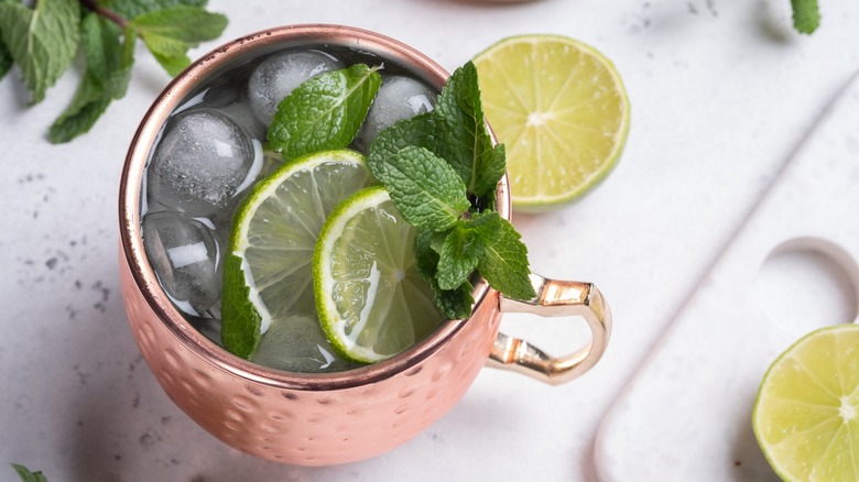 Irish Mule cocktail in copper mug with lime and mint