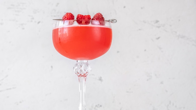 Blinker cocktail with raspberries