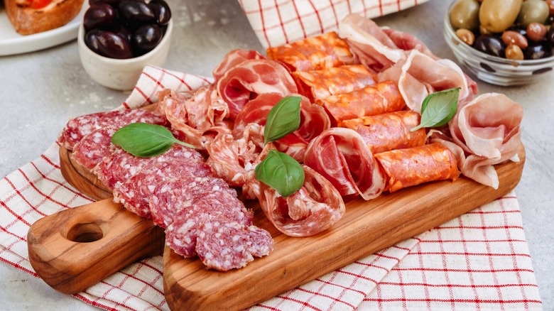 charcuterie meats on wooden board