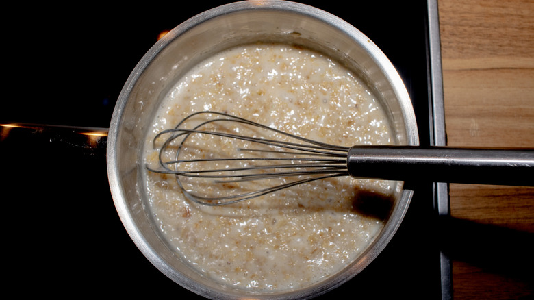 Whisking oatmeal stove