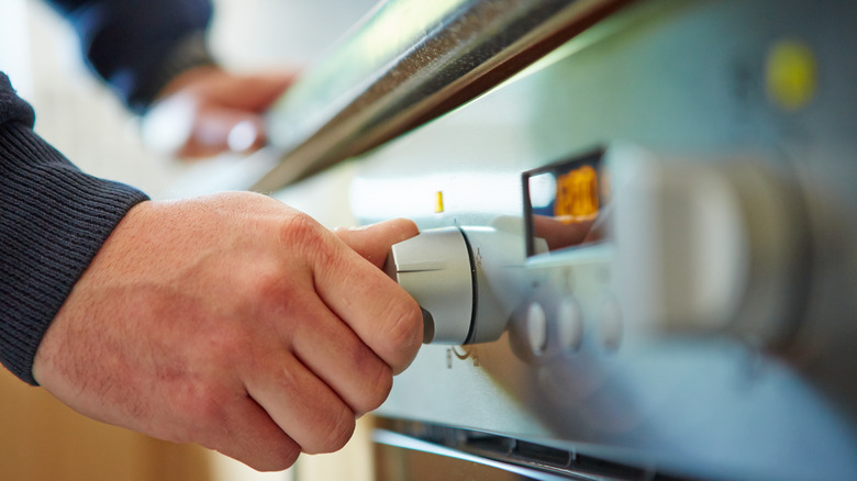 Preheating oven dial on stove