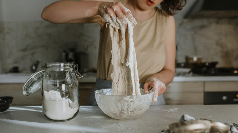 Person making sourdough bread 