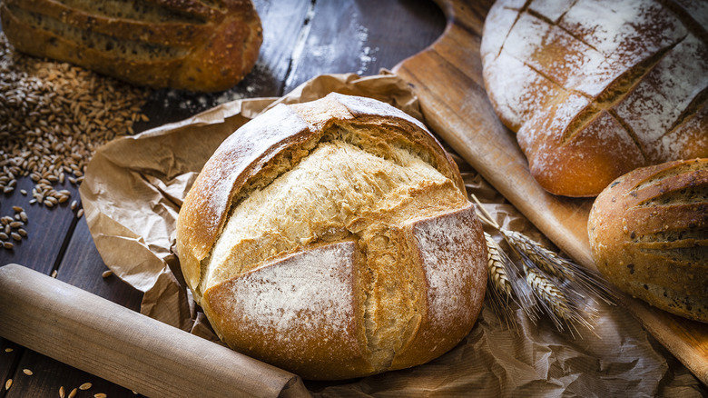 Crunchy sourdough bread on table