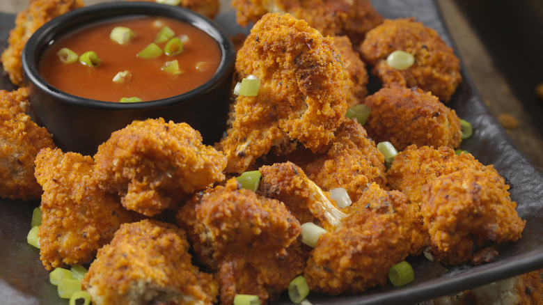 Breaded tots with dipping sauce