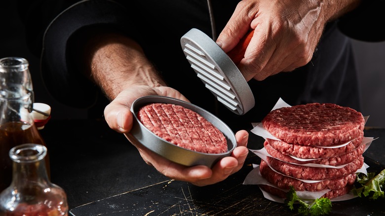 Pressing homemade burgers