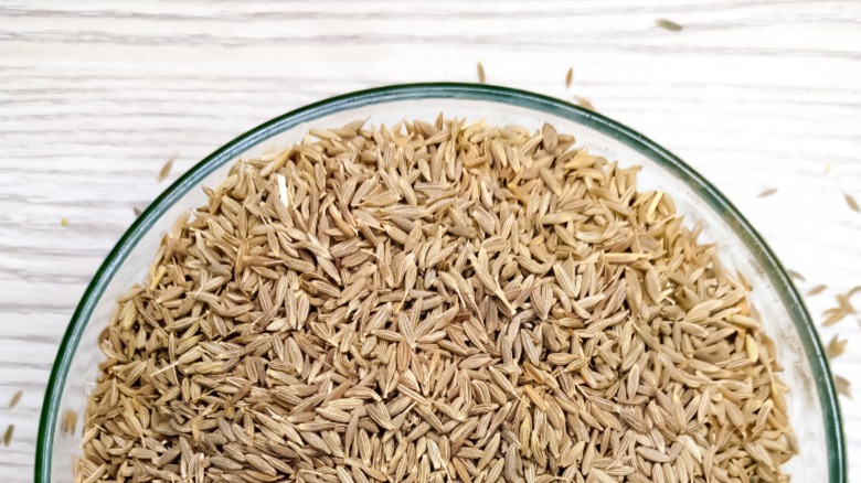 Cumin seeds in cup