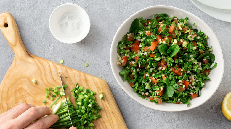 Bowl of tabouli being prepared