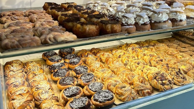 pastry case with various buns