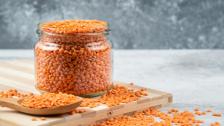 Container of red lentils