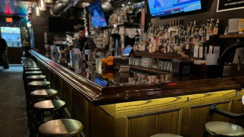 dark bar with stools