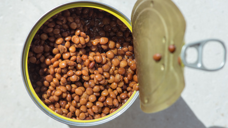 Open can of brown lentils