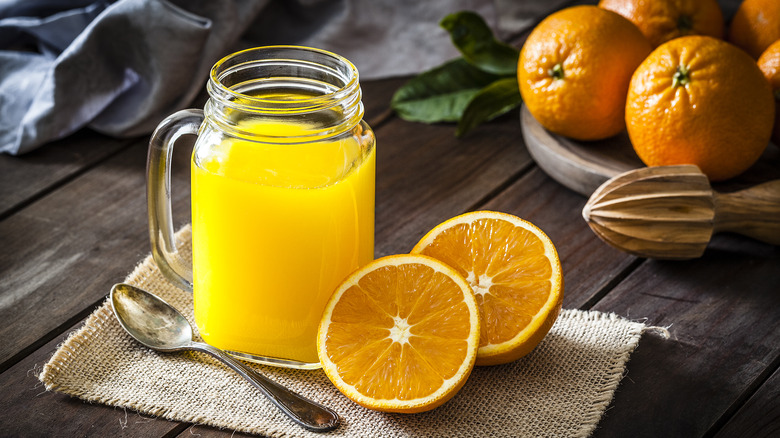 Orange juice handled glass