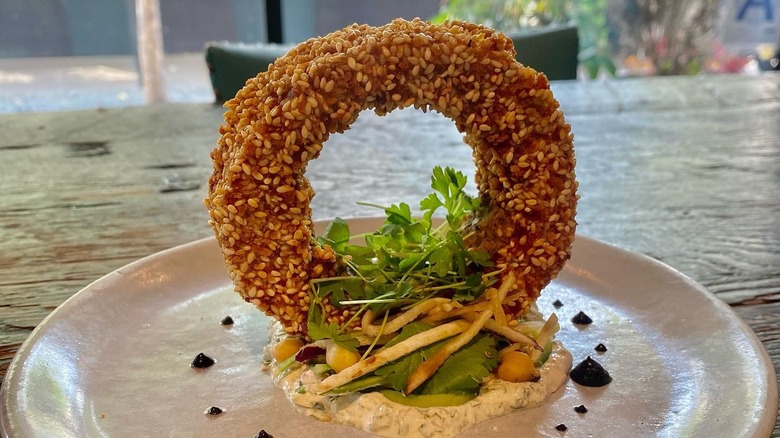 Plated sesame eggplant donut 