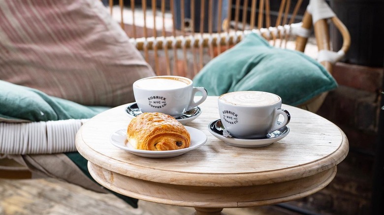 Coffee and pastry on table