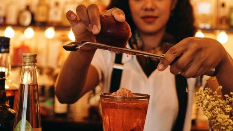 Rokc NYC bartender making cocktail