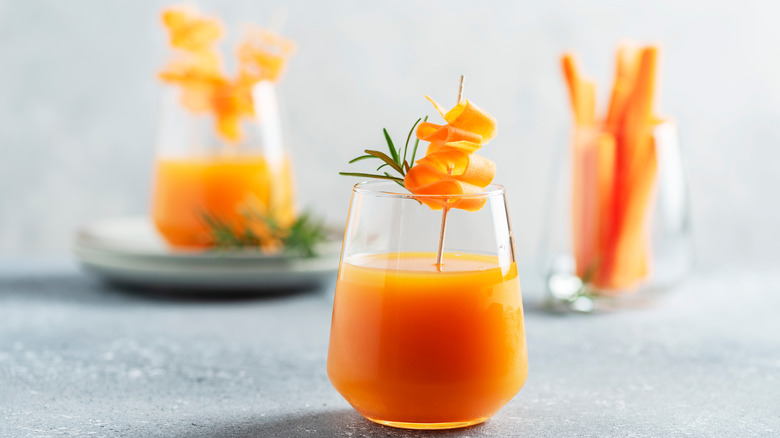 Carrot juice cocktails in glasses