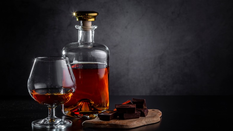 Bottle of cognac with glass