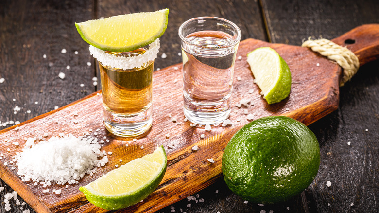 Shots of tequila with lime and salt