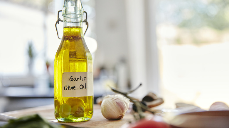 Garlic olive oil on table