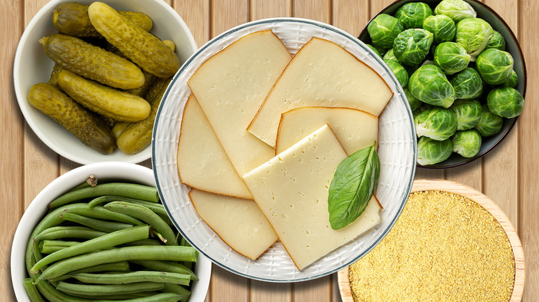 Raclette with various accompanying ingredients