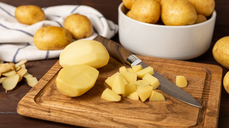 Chopped potatoes on cutting board