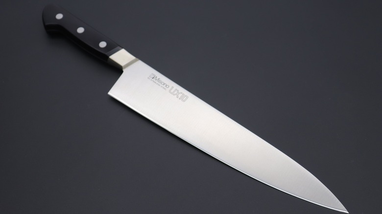 Misono gyuto on a dark background