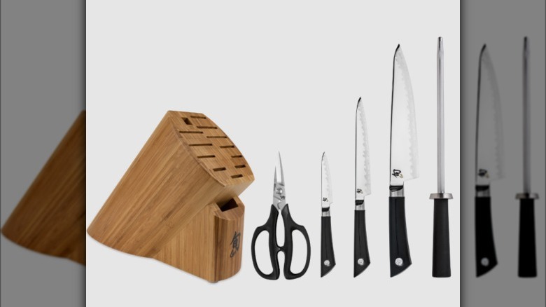 Shun knife set next to a wooden block