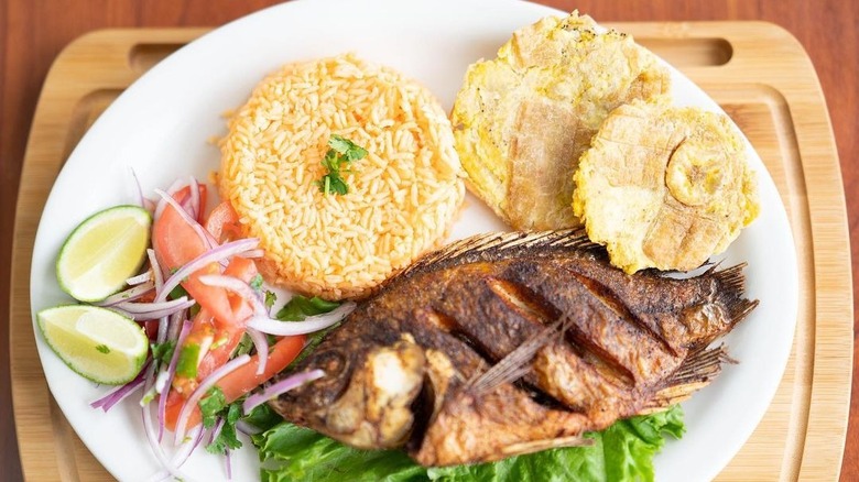 plate with fried fish and sides