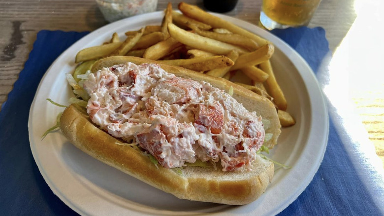 Lobster roll served with fries