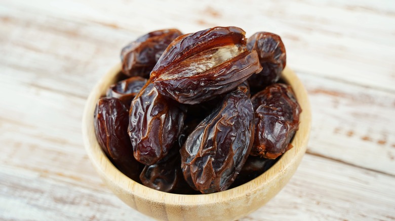 Dates in a wooden bowl