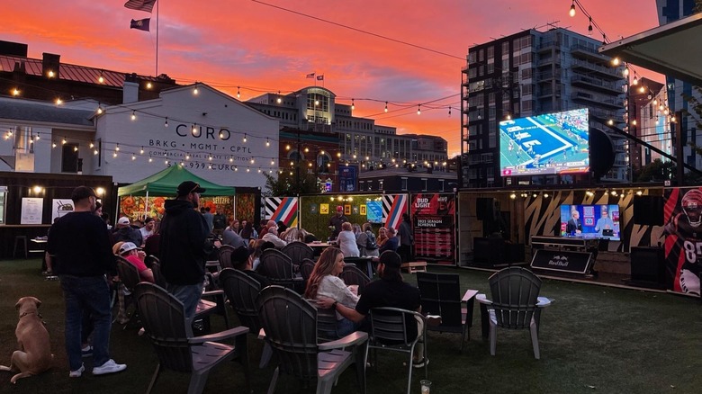 Patrons at an outdoor bar