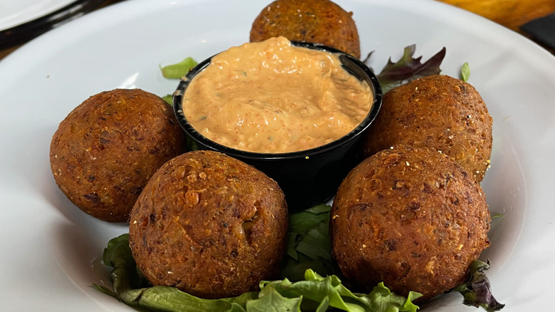 Goetta hush puppies with sauce