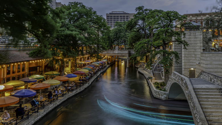 River with colorful umbrella 