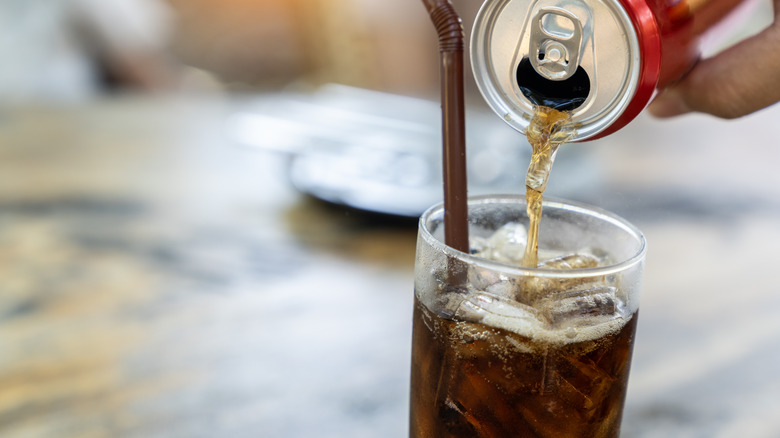 Cola poured into glass