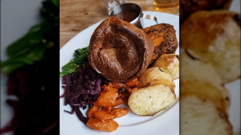 white plate with sunday roast