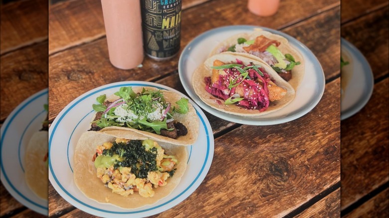 Tacos on wooden table