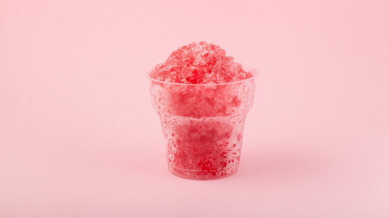 Red shaved ice in plastic cup