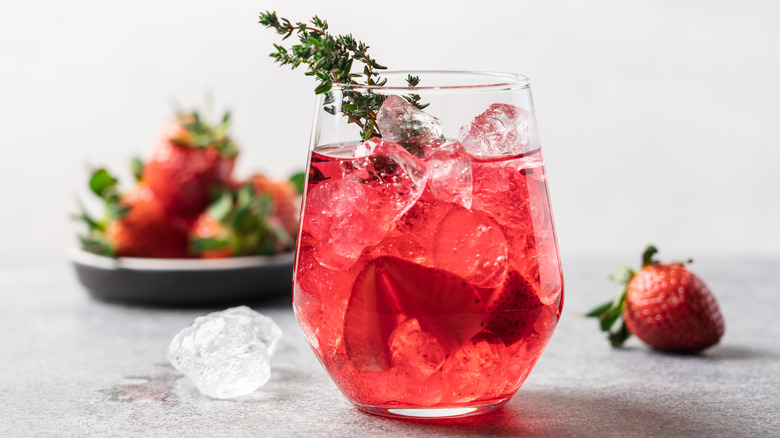 cocktail with strawberry and thyme