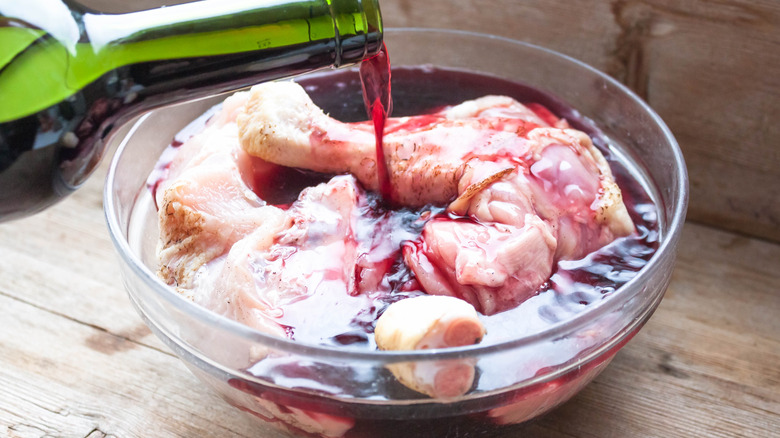 Red wine poured over meat